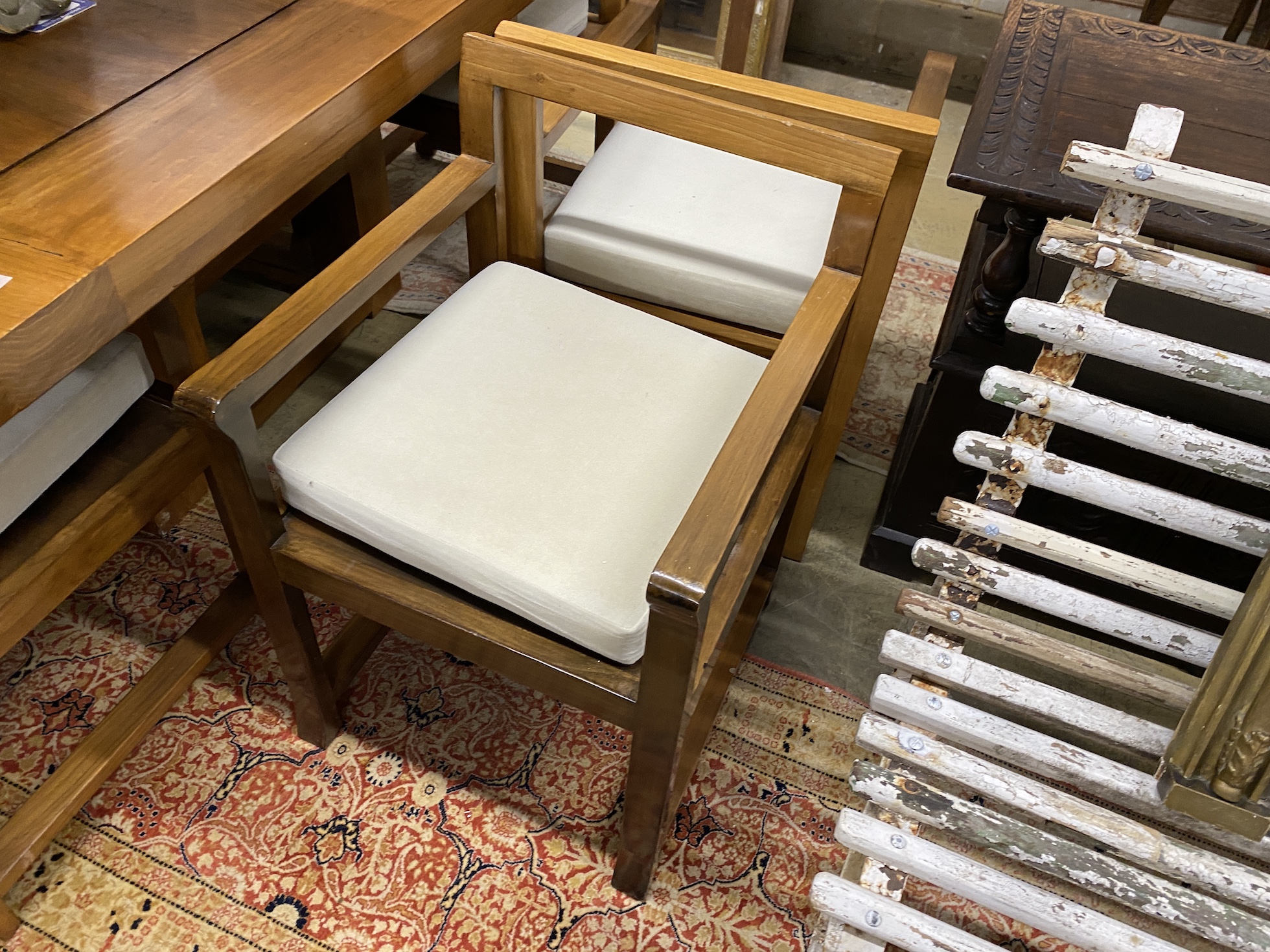 A contemporary Margaret Muir Chinese square dining table, length 152cm, height 78cm and six elbow chairs